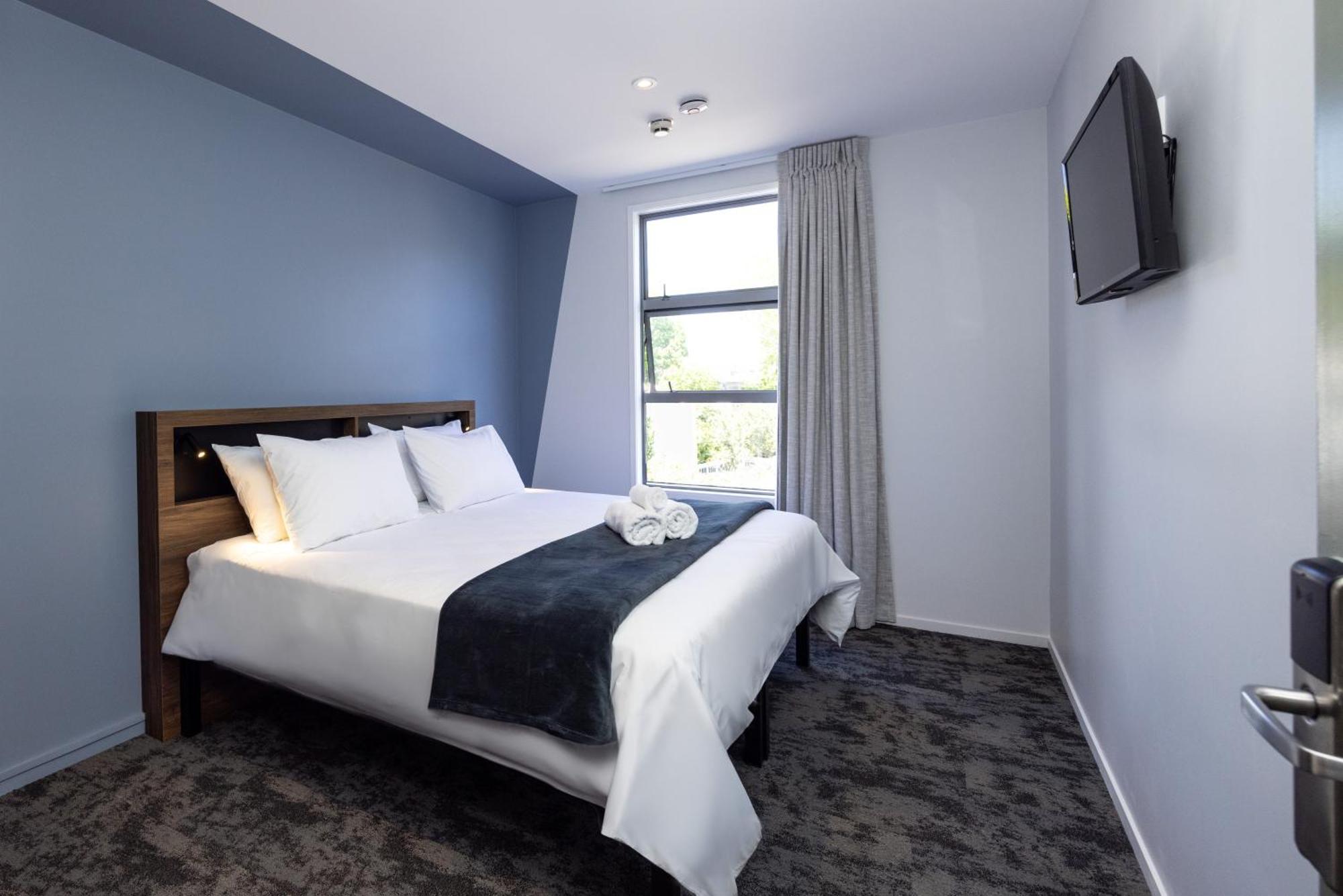 로토루아 Yha 로터루아 호스텔 외부 사진 A bedroom at the hotel